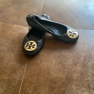 Tory Burch Black Flats with Gold Emblem